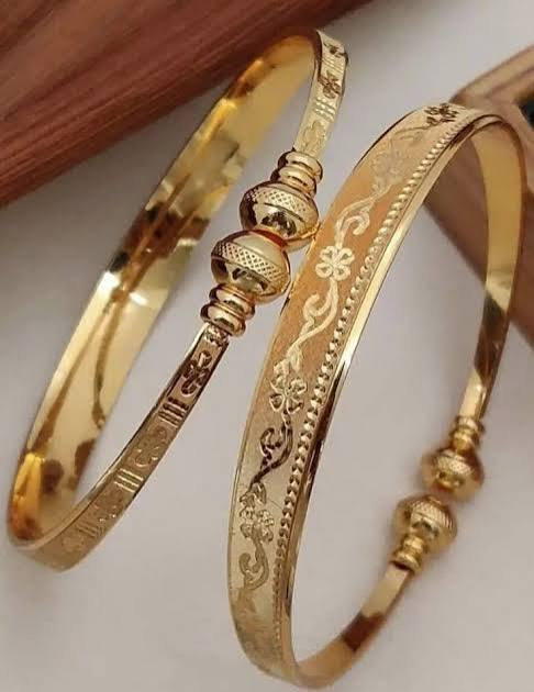 Pair of Gold-Toned Engraved Bangles
